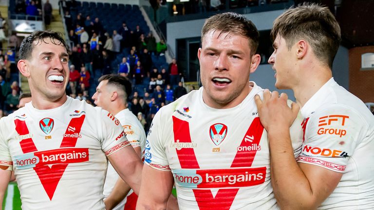 Picture by Allan McKenzie/SWpix.com - 27/09/2025 - Rugby League - Betfred Super League Eliminator - Leeds Rhinos v St Helens - AMT Headingley, Leeds, England - St Helens' Matt Whitley, Morgan Knowles and Jon Bennison celebrate victory over Leeds.