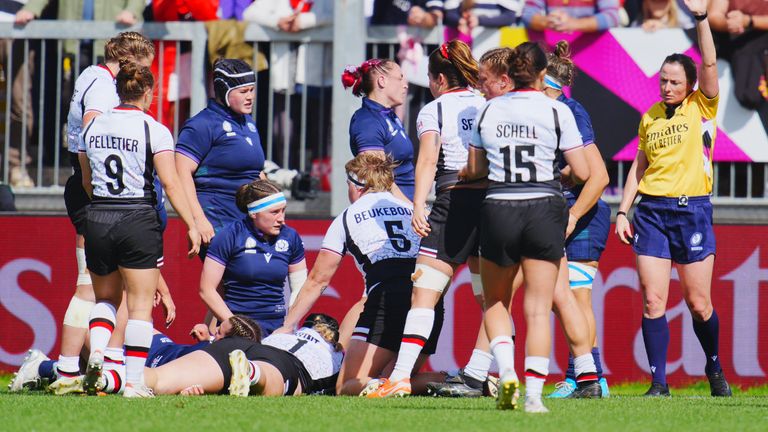 Canada's McKinley Hunt scores a try against Scotland