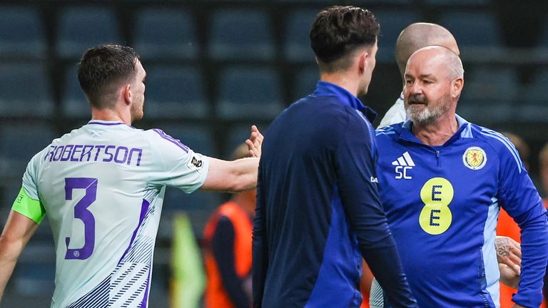 Scotland head coach Steve Clarke (R) with Andy Robertson at full time