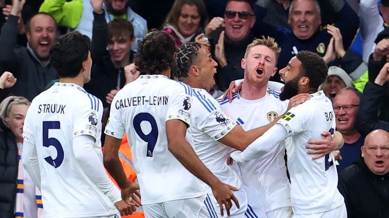 Sean Longstaff celebrates with team-mates after putting Leeds ahead