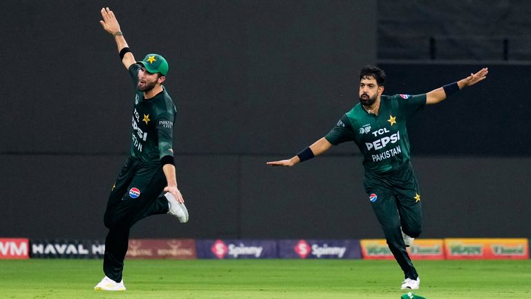 Pakistan's Shaheen Shah Afridi, left, and teammate Haris Rauf celebrate the wicket of India's Shubman Gill during the Asia Cup cricket final between India and Pakistan at Dubai International Cricket Stadium, United Arab Emirates, Sunday, Sept. 28, 2025. (AP Photo/Altaf Qadri)