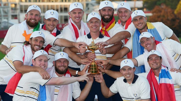 Team Europe poses with the Ryder Cup trophy