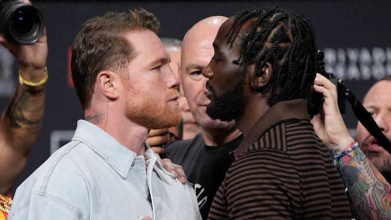 Canelo Alvarez, left, and Terence Crawford face off during a news conference for their upcoming boxing match Friday, June 27, 2025, in Las Vegas. (AP Photo/John Locher)