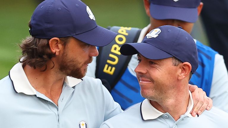 FARMINGDALE, NY - SEPTEMBER 26: Rory McIlroy and Tommy Fleetwood representing Europe in Ryder Cup walk onto the first tee during Session 1 - Foursomes on September 26, 2025 at Bethpage Black in Farmingdale, New York. (Photo by Rich Graessle/Icon Sportswire) (Icon Sportswire via AP Images)