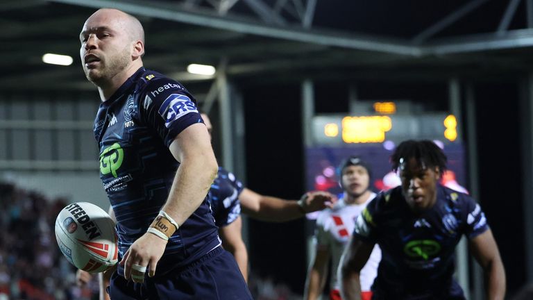 Wigan Warriors' Liam Marshall celebrates scoring a try