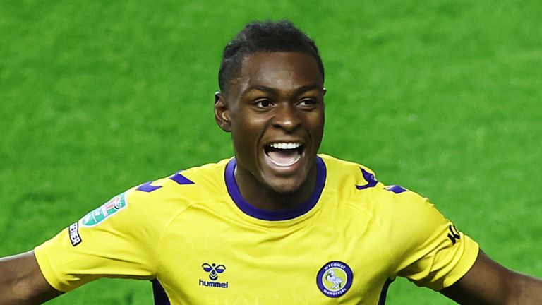 Donnel McNeilly of Wycombe Wanderers celebrates scoring his team's second goal in the win at Wigan