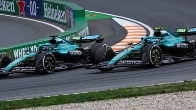 Aston Martin's Lance Stroll and Fernando Alonso go wheel to wheel