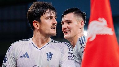 Harry Maguire is congratulated by team-mate Benjamin Sesko after restoring Manchester United's lead at Liverpool