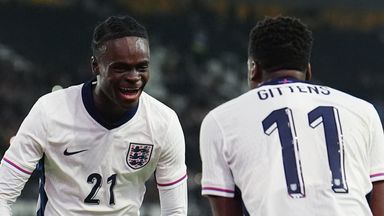 Tyrique George celebrates with Chelsea and England U21 team-mate Jamie Gittens after scoring against Andorra