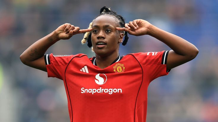 Melvine Malard of Manchester United celebrates scoring her team's equaliser