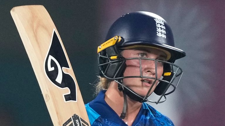 England's Alice Capsey celebrates her fifty runs during the ICC Women's Cricket World Cup semifinal match between England and South Africa