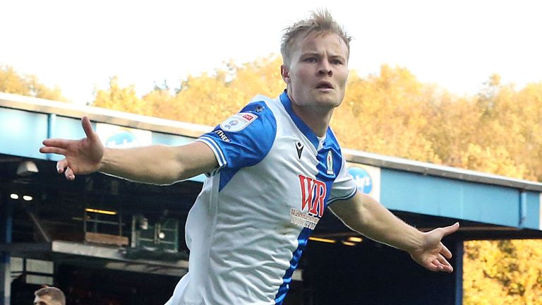 Blackburn Rovers' Andri Gudjohnsen wheels away in celebration after scoring his side's second goal