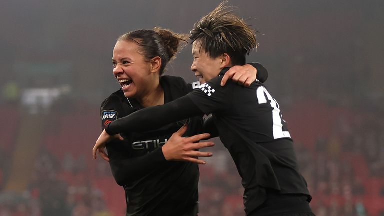 Aoba Fujino (right) of Manchester City celebrates with Iman Beney after scoring her team's second goal 