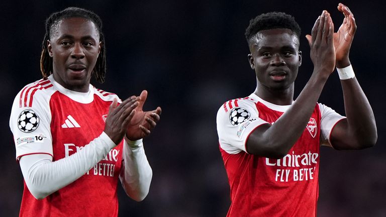 Arsenal's Eberechi Eze and Bukayo Saka applaud the fans after the Champions League win over Olympiakos