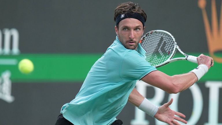 Arthur Rinderknech of France..looks to play a return to Valentin Vacherot of Monaco during the final of the Shanghai Masters tennis tournament at Qizhong Forest Sports City Tennis Center, in Shanghai, China, Sunday, Oct. 12, 2025. (AP Photo/Andy Wong)