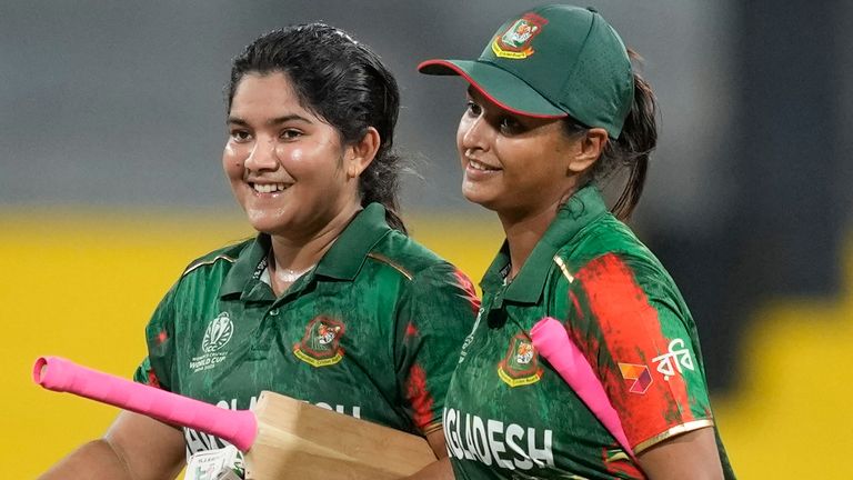 Bangladesh's Rubya Haider, left, and Sobhana Mostary celebrate their win in the ICC Women's Cricket World Cup match between Bangladesh and Pakistan in Colombo, Sri Lanka, Thursday, Oct. 2, 2025.(AP Photo/Eranga Jayawardena)