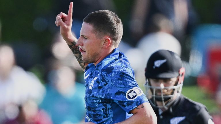 England's Brydon Carse celebrates the wicket of New Zealand's Kane Williamson in the first ODI at Mount Maunganui (Associated Press)