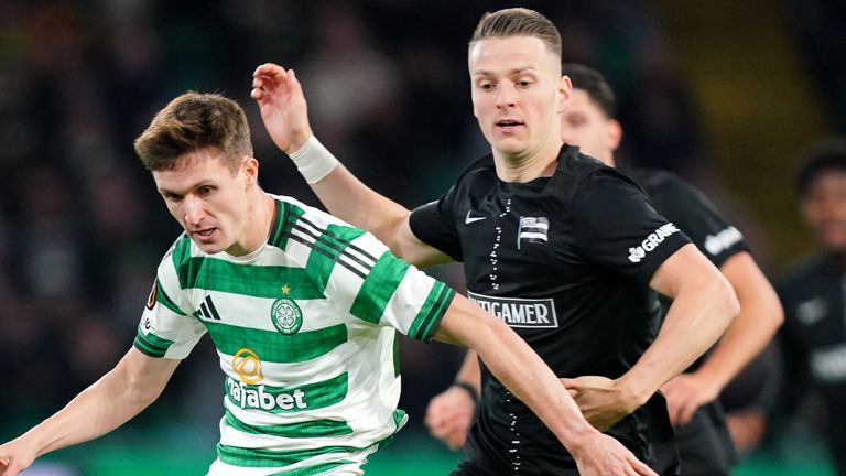 Celtic's Johnny Kenny (left) and Sturm Graz's Dimitri Lavelee battle for the ball during the UEFA Europa League match at Celtic Park, Glasgo