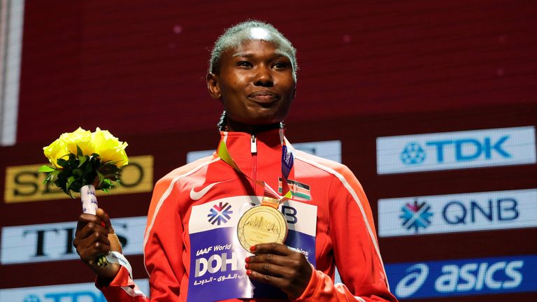 Ruth Chepngetich with her gold medal for the women's marathon at the World Athletics Championships in Doha (AP Photo/Nariman El-Mofty, file)