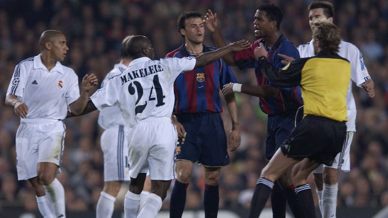 Barcelona's Patrick Kluivert clashes with Real Madrid's Claude Makelele during El Clasico