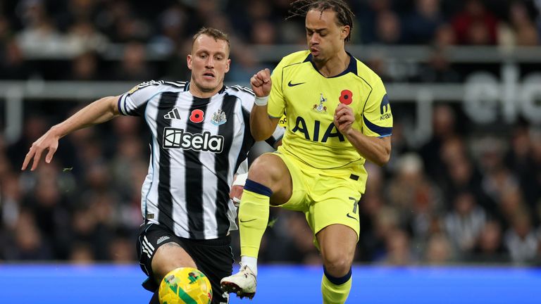 Dan Byrne and Xavi Simmons battle for the ball in Newcastle's Carabao Cup fourth round match against Spurs