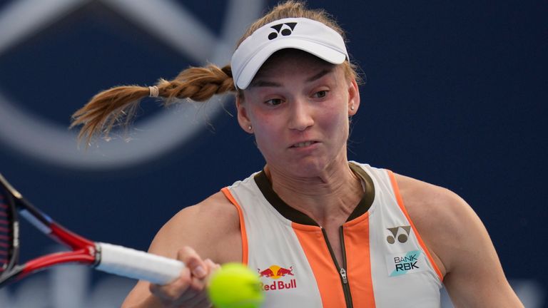 Elena Rybakina of Kazakhstan returns a shot from Caty Mcnally of the United States in a women's singles match for the China Open tennis tournament in Beijing, China, Friday, Sept. 26, 2025. (AP Photo/Ng Han Guan)