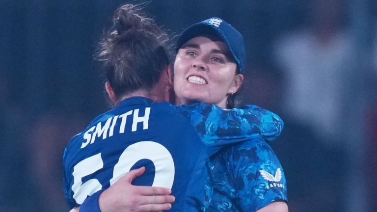 England's players celebrate after beating India by four runs in a Women's World Cup thriller in Indore (Associated Press)