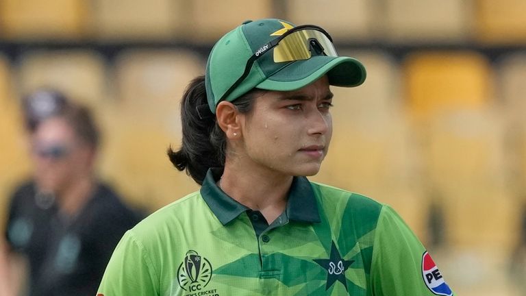 Pakistan's captain Fatima Sana watches as England's captain Nat Sciver-Brunt tosses a coin before the ICC Women's Cricket World Cup match between England and Pakistan at Premadasa Stadium in Colombo, Sri Lanka, Wednesday, Oct, 15, 2025. (AP Photo/Eranga Jayawardena)