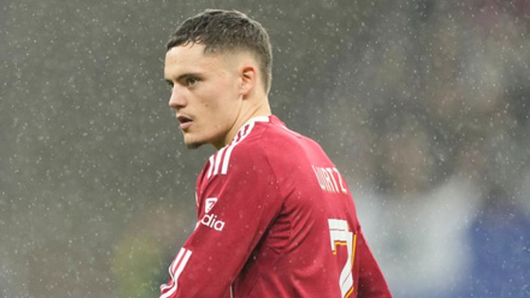 Liverpool's Florian Wirtz walks during the Champions League opening phase soccer match between Eintracht Frankfurt and Liverpool in Frankfurt, Germany, Wednesday, Oct. 22, 2025. (AP Photo/Michael Probst)