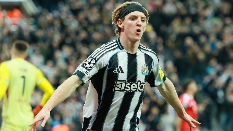 Anthony Gordon celebrates after scoring a goal against Benfica