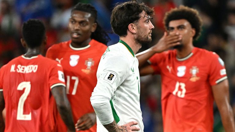 Republic of Ireland's Troy Parrott (centre) looks dejected as Portugal players celebrate