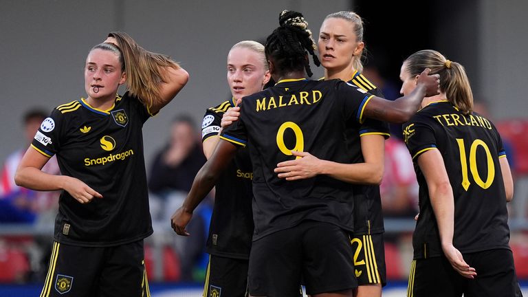 Fridolina Rolfoe of Manchester United celebrates scoring her team's first goal vs Atletico Madrid with team-mates