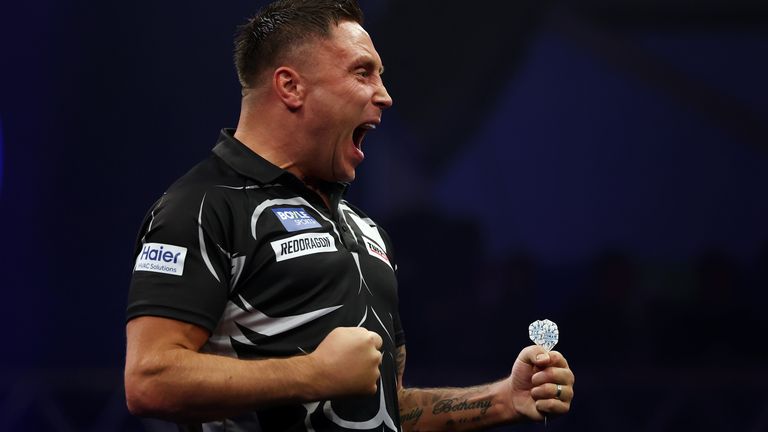 Gerwyn Price celebrates beating Josh Rock at the World Grand Prix of Darts