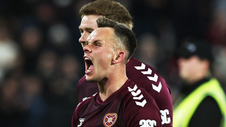 Hearts captain Lawrence Shankland celebrates after beaten Hibs