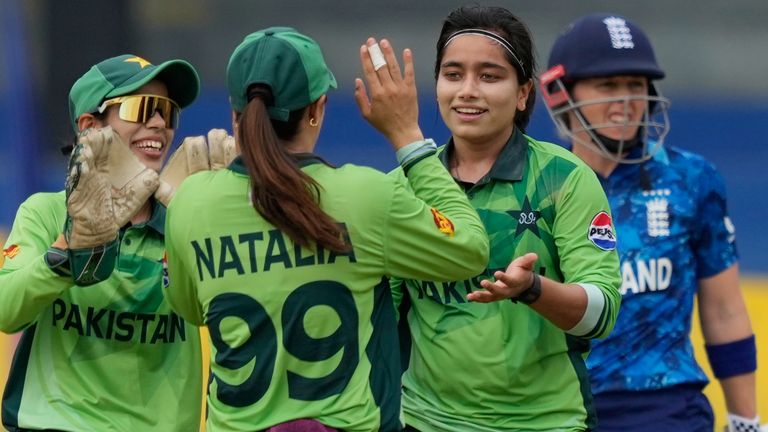 Pakistan captain Fatima Sana celebrates the wicket of England's Heather Knight during the Women's Cricket World Cup (Associated Press)