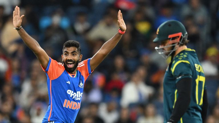 India's Jasprit Bumrah, left, appeals for the wicket of Australia's Mitchell Owen during their T20 cricket match in Melbourne, Australia, Friday, Oct. 31, 2025. (James Ross/AAP Image via AP)