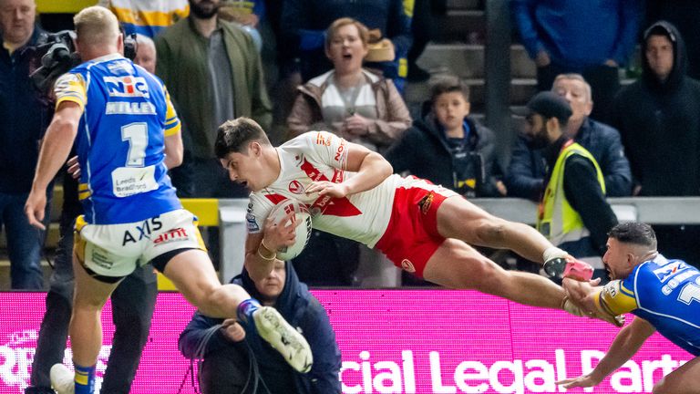 Picture by Allan McKenzie/SWpix.com - 27/09/2025 - Rugby League - Betfred Super League Eliminator - Leeds Rhinos v St Helens - AMT Headingley, Leeds, England - St Helens' Jon Bennison is forced into touch by Leeds' Jake Connor.
