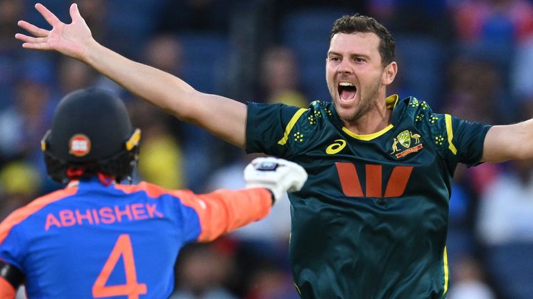 Australia's Josh Hazlewood, center, appeals unsuccessfully for the wicket of India's Shubman Gill, right, during their T20 cricket match in Melbourne, Australia, Friday, Oct. 31, 2025. (James Ross/AAP Image via AP)