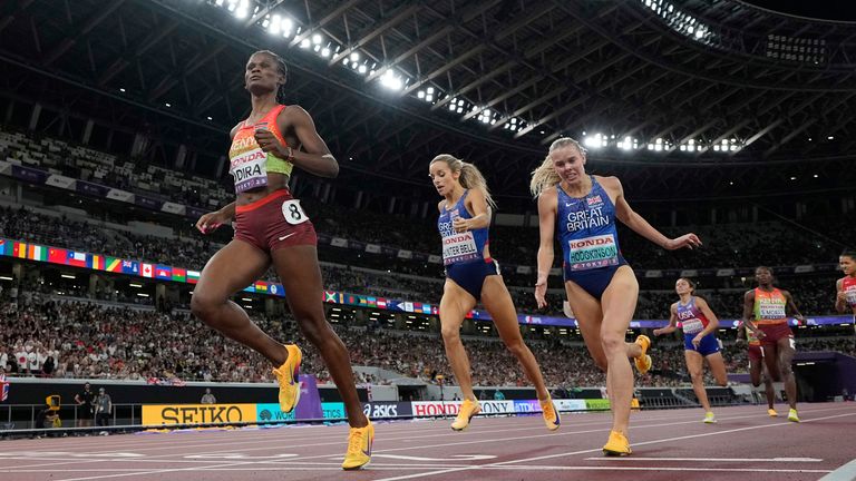 Kenya's Lilian Odira, left, wins the the women's 800 meters final ahead of Britain's Keely Hodgkinson and Georgia Hunter Bell at the World Athletics Championships in Tokyo, Sunday, Sept. 21, 2025. (AP Photo/David J. Phillip)