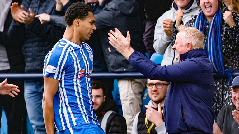 KILMARNOCK, SCOTLAND - OCTOBER 04: Kilmarnock's Marcus Dackers (L) celebrates scoring to make it 2-0 with Assistant Manager Stephen Frail during a William Hill Premiership match between Kilmarnock and St Mirren at Rugby Park, on October 04, 2025, in Kilmarnock, Scotland.  (Photo by Ross MacDonald / SNS Group)