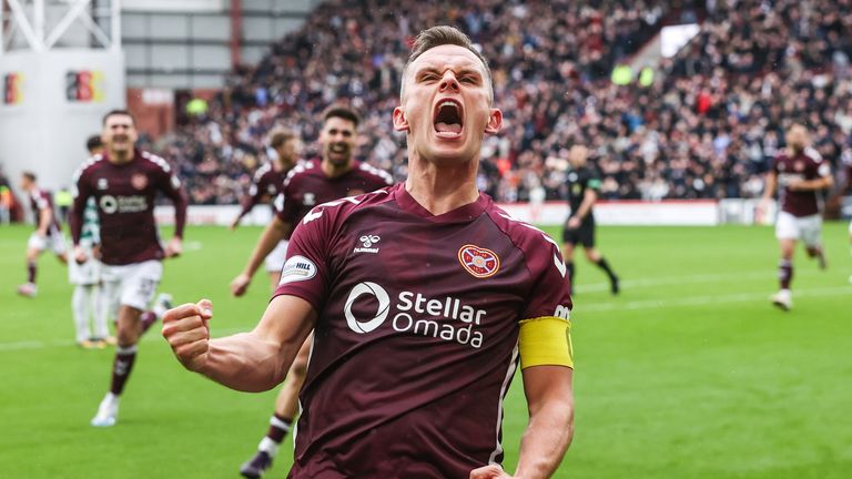 Hearts' Lawrence Shankland celebrates after Celtic's Dane Murray scores an own goal to make it 1-0