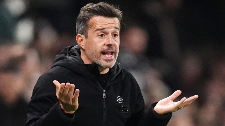 Marco Silva gestures with both hands in front of his body during Fulham's match against Arsenal on October 18 at Craven Cottage