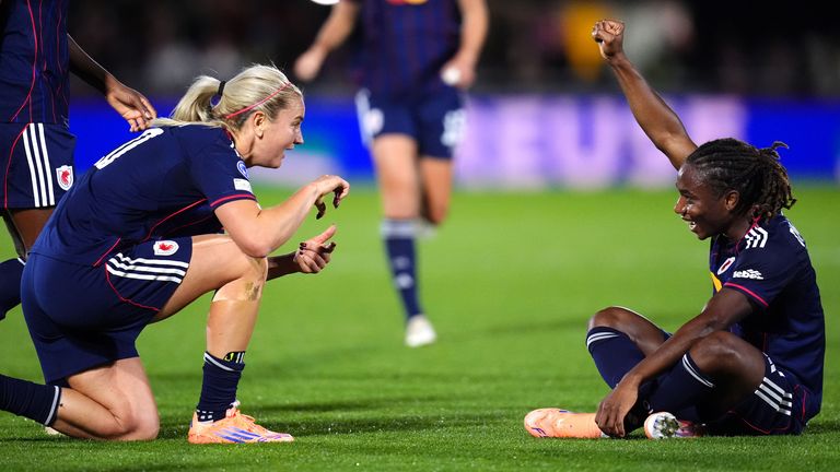 Lyon's Melchie Dumornay (right) celebrates scoring their side's second goal of the game