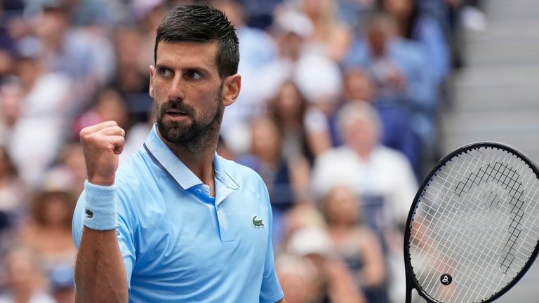 Novak Djokovic, of Serbia, reacts to a point against Carlos Alcaraz, of Spain, during the men's singles semifinals of the U.S. Open tennis championships, Friday, Sept. 5, 2025, in New York. (AP Photo/Seth Wenig)