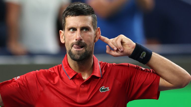 Novak Djokovic of Serbia celebrates during his match against Jannik Hanfmann of Germany in the men's singles third round match on the seventh day of