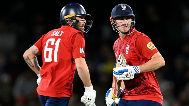 England's Phil Salt, left, and Harry Brook make runs against New Zealand during their T20 cricket match in Christchurch, New Zealand, Monday, Oct. 20, 2025. (Andrew Cornaga/Photosport via AP)