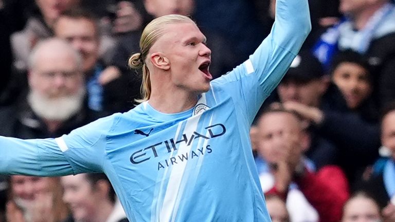Erling Haaland celebrates after doubling Man City's lead against Everton