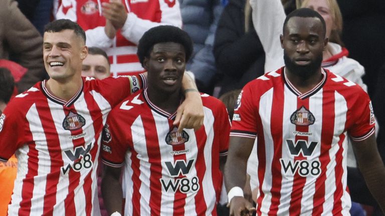 Granit Xhaka, Eliezer Mayenda and Lutsharel Geertruida celebrate after Wolves' Ladislav Krejci's own goal gives Sunderland a 2-0 lead 