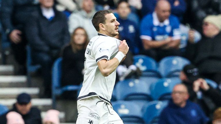 GLASGOW, SCOTLAND - OCTOBER 18: Dundee United's Kristijan Trapanovski celebrates as he scores to make it 1-1 during a William Hill Premiership match between Rangers and Dundee United at Ibrox Stadium, on October 18, 2025, in Glasgow, Scotland.  (Photo by Alan Harvey / SNS Group)