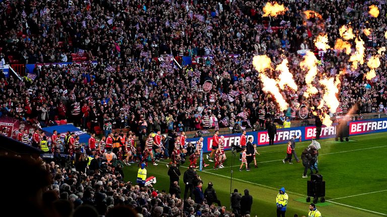 Picture by Olly Hassell/SWpix.com - 12/10/2024 - Rugby League - Betfred Super League Grand Final - Wigan Warriors v Hull KR - Old Trafford, Manchester, England - Hull KR and Wigan Warriors walk out for kick off